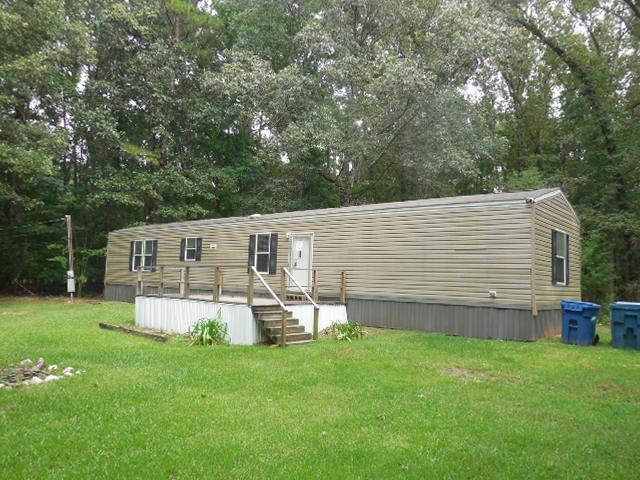 Remote master bedroom with walk in closet. Located across the street from Lake Bistineau. Property sold in as is condition.