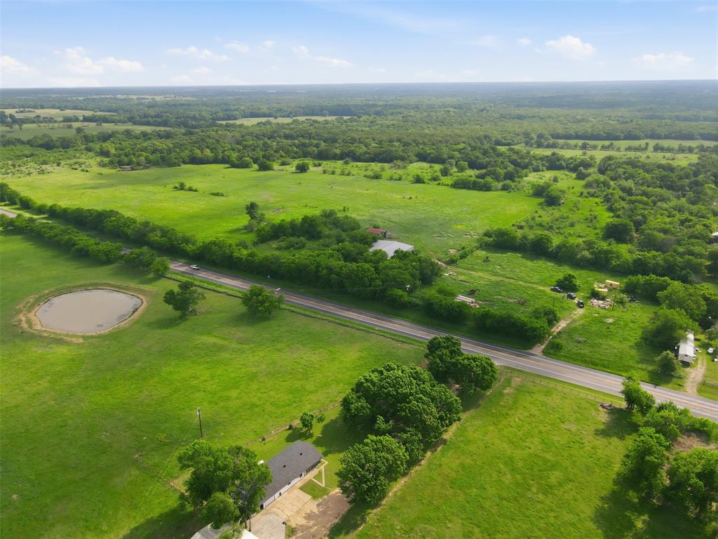 MOTIVATED SELLER!! BRING YOUR OFFERS!! Approximately 3,300 feet of Highway 19 frontage is just the beginning of what this amazing property has to offer!  With lush pastureland, beautiful wooded areas, water for your animals, a hay barn, and a covered corral with small office space this property is ready for your ranching activities and provides multiple homesites for your dream home.  Not interested in ranching?  No worries! With over 220 acres of unrestricted land, your dreams can come alive!  There are no known restrictions on the property and it sits outside city limits, so there are no zoning requirements!  Bring your mobile home, tiny house, dream house plans, multi-generational family plans, commercial business, or plans for dividing the property and let your imagination be your guide to using this versatile property.  With water already on site, this land offers so many opportunities, from ranching to retreat to subdivision, and just needs you to bring your vision to life.  Located less than 10 miles from the bustling center of Sulphur Springs, all the convenience of the city will be nearby, while you enjoy your rural escape from the city!  This is the first time in decades this property has been on the market, so don't miss this rare opportunity to own a fabulous expanse of Hopkins County, Texas!