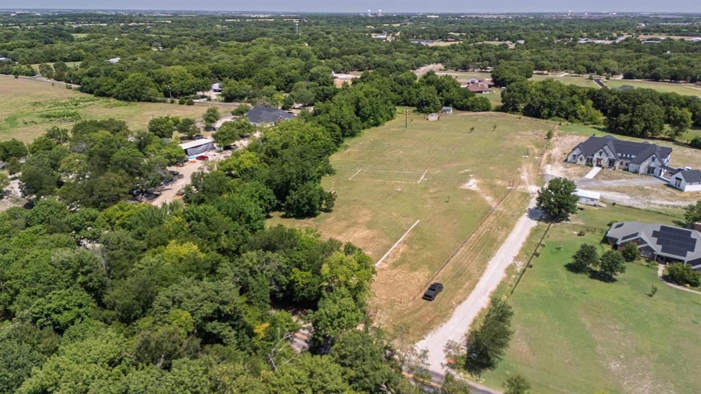 This 1.5 acres of unzoned land at 2895 County Road 341 in McKinney offers flexibility for residential or commercial use, subject to buyer verification and permitting requirements. With water available, overhead electricity at the property, and a septic system needed, this level parcel is ready for a wide variety of future possibilities. Located in the growing north McKinney and Melissa corridor, the property offers county road frontage, an open building site, mature trees along the perimeter, and a peaceful rural setting while remaining close to everyday conveniences. Downtown Melissa, Buc-ee's, grocery stores, restaurants, and shopping are all within approximately 5 to 10 minutes. U.S. Highway 75 is only minutes away, providing convenient access to McKinney, Sherman, Plano, Allen, and the greater Dallas-Fort Worth Metroplex. Historic Downtown McKinney, H-E-B, Costco, McKinney National Airport, Bonnie Wenk Park, and numerous retail and dining destinations are all within approximately 15 to 20 minutes, giving future owners the opportunity to enjoy acreage living without sacrificing convenience. This unzoned acreage of this size is becoming increasingly difficult to find in Collin County. Whether you're planning a custom residence, office, workshop, small business, or long-term investment, this property offers the flexibility, accessibility, and location that today's buyers are searching for. Schedule your private tour and explore the possibilities.