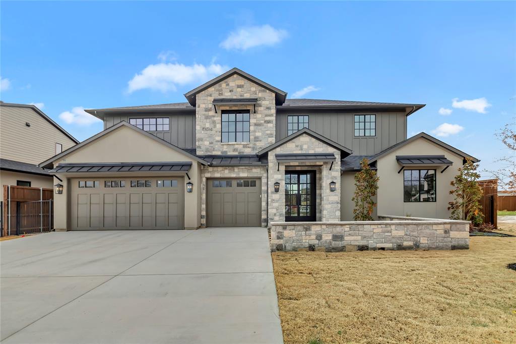 Experience modern luxury and timeless craftsmanship in this stunning new construction by VPG Custom Homes, ideally located in the prestigious Carroll ISD within the coveted Ferguson Place community. This 5-bedroom, 4.5-bath, 3-car garage residence spans 3,478 square feet of meticulously designed living space, blending elegance, innovation, and comfort at every turn.

Step inside and discover a chef-inspired kitchen featuring an elite Thermador appliance package with a built-in refrigerator, quartz surfaces, custom cabinetry, and a spacious walk-in pantry. The open-concept layout flows effortlessly into expansive living and dining areas, accentuated by rich hardwood flooring, designer lighting, and warm, inviting tones.

Retreat to the primary suite sanctuary, complete with dual vanities, a spa-like bath, and an oversized his-and-her closet with built-in washer dryer connections—the ultimate in convenience and luxury. Upstairs, you’ll find additional bedrooms with en suite baths and thoughtfully designed flex spaces for work, play, or entertainment.

Entertain effortlessly with an outdoor patio featuring a cozy fireplace, motorized shades, and gas grill connections—perfect for year-round gatherings. Energy-efficient upgrades include tankless water heaters, a high-performance HVAC system, and generator-ready connections for added peace of mind.

With designer finishes throughout and a floor plan that balances sophistication with livability, this home is more than a place to live—it’s a statement of style, comfort, and modern Texas luxury.