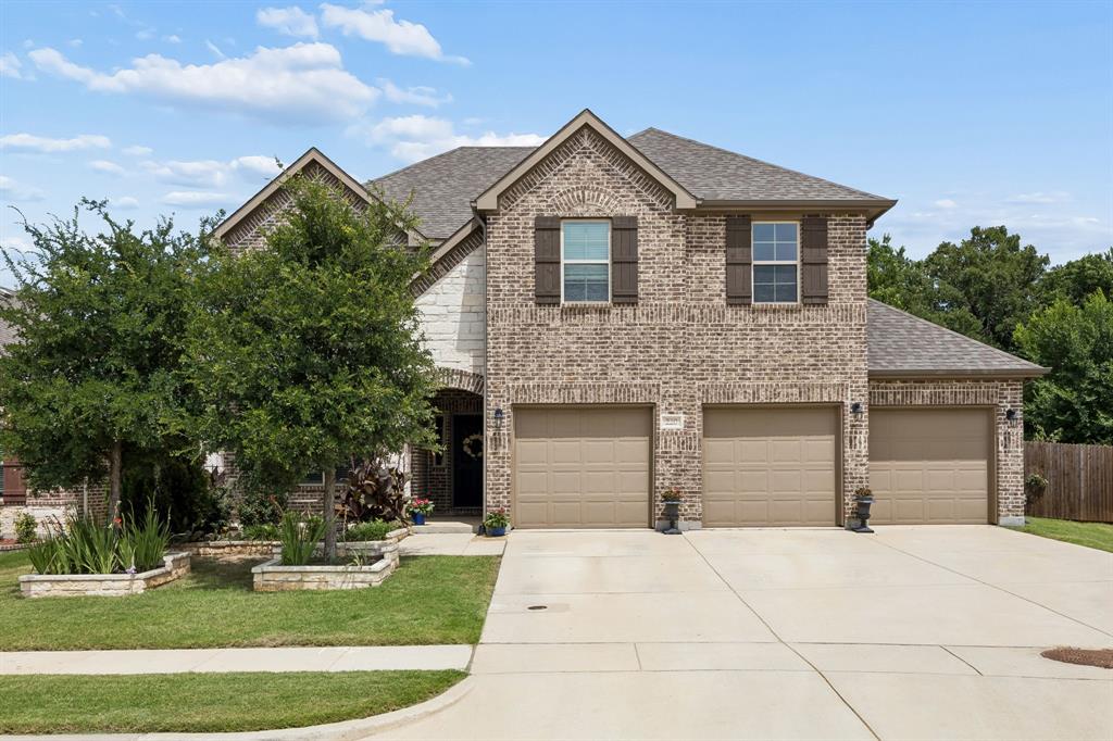 A rare find in Hickory Creek—this beautifully upgraded 2020-built home offers 3,675 square feet of modern living on one of the neighborhood’s largest lots (over 10,000 sq ft) with a spacious 3-car garage. Step inside and experience thoughtful design and quality finishes throughout. Rich hardwood flooring flows through the main living areas, guiding you to a dedicated home office with French doors for privacy and focus. The heart of the home is the gourmet kitchen featuring a massive wraparound island perfect for entertaining, quartz countertops, stainless steel double ovens, a 5-burner gas cooktop, a vent hood, a built-in microwave, and a large walk-in pantry. The open-concept living area boasts a striking stone fireplace, vaulted ceilings, and abundant natural light. Retreat to the luxurious primary suite with an upgraded bath that includes a convenient exterior shower control. Upstairs, you’ll find a generous game room, a dedicated media room ideal for movie nights, and an unfinished walk-in attic with huge potential for a bonus room, extra storage, or custom space. Outside, enjoy peaceful mornings on the covered patio overlooking an expansive backyard ready for your vision—whether it’s gardening, a pool, outdoor entertaining, or homesteading. The property even includes a chicken coop that can be conveyed if desired. Nestled against a wooded backdrop, the setting feels private and serene while offering quick, easy access to the highway for effortless commutes to Denton, Dallas-Fort Worth, and beyond. With $150,000+ in thoughtful upgrades, this 4-bedroom, 3.5-bath home stands out as newer and more refined than most in the area. Don’t miss this opportunity for comfortable, move-in-ready living in Hickory Creek!