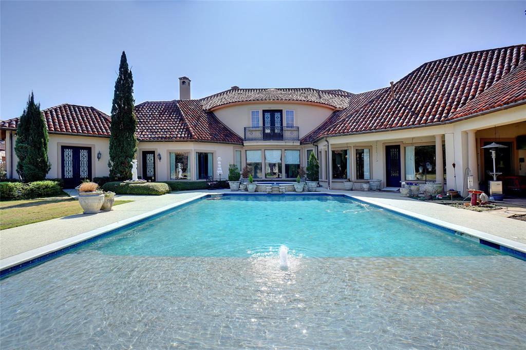 HOME JUST REDUCED FROM $3,999.999 TO $2,999.999, A MILLION DOLLAR PRICE REDUCTION!

 INSPIRED BY THE GREAT VILLAS OF TUSCANY*APPRAISED AT $5.3 MILLION APRIL 2024*STUNNING ESTATE,LOCATED IN EXCLUSIVE GUARDED & GATED LAKE COMMUNITY OF CHATEAU DU LAC*NESTLED ON A SPRAWLING 2 ACRE LOT,CANVASSED BY MAJESTIC TREES*PRIVACY ABOUNDS*GRAND ENTRY W-ROTUNDA CEILING & HAND-PAINTED DOME*BUILT SPARING NO EXPENSE & PERFECT FOR ENTERTAINING WITH A GREAT FLOOR PLAN THAT FLOWS SEAMLESSLY*UNMATCHED ANYWHERE!*RELAX IN YOUR OWN BACKYARD PARADISE*CREATED FOR ENTERTAINING*OPENS TO SEVERAL PATIOS INCLUDING A LARGE PATIO W-OUTSIDE LIVING AREA, FIREPLACE & GRILL*BEAUTIFUL VIEWS OF EXPANSIVE POOL, BRIDGES*VINEYARD, KOI POND & FORT*NIGHT LIGHTING*STUDY W-FIREPLACE & READING AREA*WINE TASTING ROOM*SITTING AREA W-WINE STORAGE*UPPER LEVEL OFFERS 3 OVERSIZED BEDROOM EN-SUITES PLUS BILLIARDS ROOM,WET BAR & 2ND STUDY*PRIMARY & GUEST SUITE LOCATED ON 1ST LEVEL*GOURMET KITCHEN FEATURES DCS PROFESSIONAL SERIES GAS RANGE W-8 BURNERS & 2 OVENS*QUICK POSSESSION*5 HVAC ZONES*AEROBIC SEPTIC*CITY WATER*REAL STUCCO*TILE ROOF*5 TOTAL PARKING*4 OVERSIZED ATTACHED GARAGES & PORTE COCHERE*KITCHEN FEATURES SUBZERO FRIDGE, PASTA FAUCET, ISLAND, VEGGIE SINK, BUILT-IN DESK & TOP-OF-THE-LINE APPLIANCES*PRIMARY SUITE W 2-STORY CLOSET, FIREPLACE & FANTASTIC SHOWER*OTHER AMENITIES INCLUDE HAND-FORGED IRON BALUSTERS, ROJO TRAVERTINE FLOORING*3 FIREPLACES*5 FULL BATHS*2 HALF BATHS*SEE ROOM BY ROOM AMENITIES LIST, DRONE VIDEO SET TO MUSIC ON NTREIS*SEE APPRAISAL DONE BY ROBERT TOTTEN, VALUE AT $5,300.000*