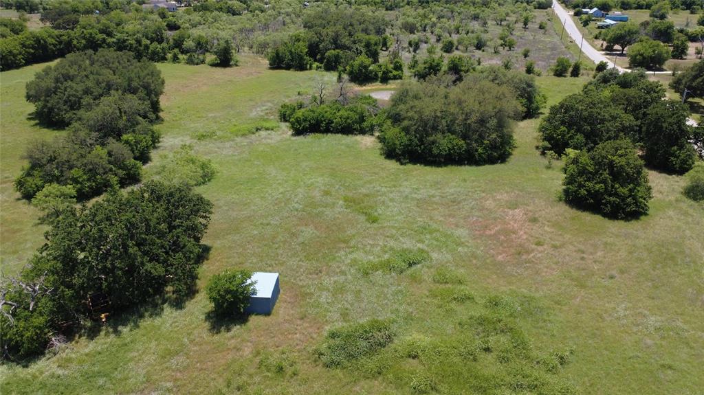 Exceptional development opportunity within the city limits of Hico, TX! This 7.723-acre tract is ideally located along existing Chestnut Street southeast of Hico schools and near areas of ongoing residential growth. Featuring gently rolling terrain, mostly open pasture, and scattered mature live oaks and native trees, the property offers an attractive setting for future residential development or investment.

The tract is bordered by platted city streets including 6th Street, 7th Street, and Magnolia Street; however, these streets are not currently constructed. Existing sections of 6th, 7th, and Magnolia terminate at the corners of the property, creating potential for future extension and lot-and-block development subject to city approval and infrastructure improvements. City water and sewer are available along Chestnut Street.

With strong long-term upside, excellent location, and flexible development potential, this is a rare opportunity to acquire a sizable in-town tract in one of Central Texas’ most charming and growing small towns.

Buyers are responsible for verifying all information and conducting their own due diligence. No guarantees are made regarding the accuracy of information provided, including property value, zoning, utilities, development potential, street extensions, permissible uses, amenities, or any rights that may or may not exist. Buyers are encouraged to consult with their tax, financial, legal, and development professionals and independently verify any information important to their purchase decision.