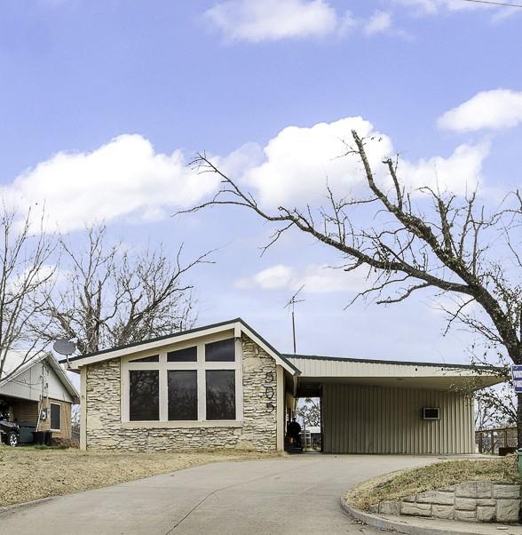 Located in the heart of a vibrant college town and just walking distance to campus, this 3 bedroom, 2 bath home offers incredible versatility....whether you’re looking for a high-demand student rental or a charming primary residence.
Situated on an oversized .248-acre lot, the property provides ample outdoor space with room to expand, entertain, or simply enjoy added privacy. Inside, the inviting living room features a wood-burning fireplace accented by beautiful exposed wood beams, creating warmth and character the moment you walk in.
The home boasts luxury vinyl plank flooring for durability and style, along with an updated kitchen designed to meet your needs while maintaining functionality for everyday living.
A standout feature is the attached carport with breezeway, leading to a versatile bonus area that could serve as additional living quarters, a private office, game room, or generous storage space that offers flexibility for homeowners or as added rental appeal.
With its unbeatable location, spacious lot, and income-producing potential, this property is a rare opportunity in a high demand area. Whether you’re expanding your investment portfolio or searching for a place to settle near campus, this home checks all the boxes.