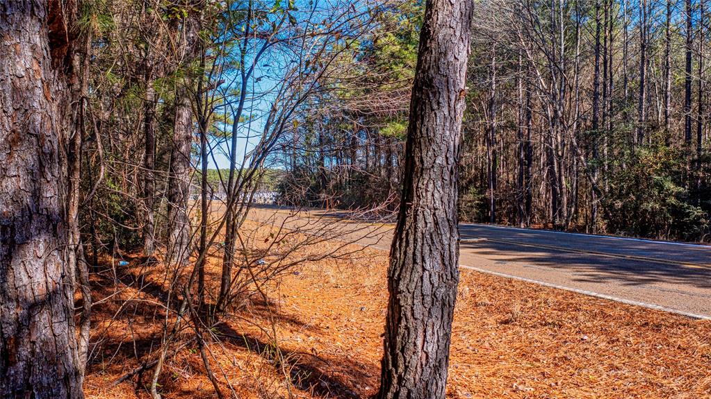 Nestled in Claiborne Parish, Louisiana, this gorgeous lot offers a serene wooded retreat. With over 5 acres of land you'll have the unique opportunity for hunting, homesteading, or off-grid living. You'll find trails weaving through the clearings, established deer blinds and abundant deer sightings. This lot is a haven for wildlife enthusiasts and those seeking a quiet escape in Louisiana.  Conveniently located just minutes from town. Schedule your appointment today. Owner financing is available with approved credit, acceptable offer and down payment.  Call for details