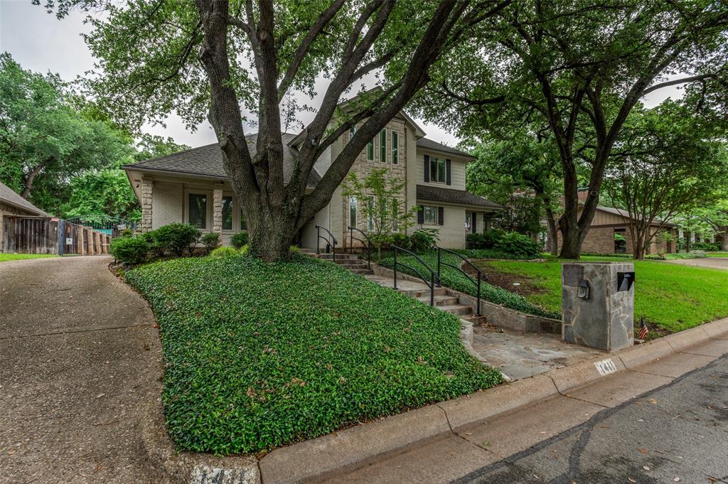 Wow! Welcome to sought-after Shady Valley Estates, perfectly situated on a quiet cul-de-sac. This fabulous 4-bedroom, 3-bath home features a desirable Jack-and-Jill bath upstairs, a 2-car garage, and a rare golf cart garage. The property is enhanced by an electric gate, beautiful landscaping, and a charming covered front porch. Built with quality construction and thoughtfully maintained, this home offers timeless design and first-class amenities throughout. The remodeled kitchen is beautifully updated and ready to enjoy. Relax or entertain in the screened-in porch and beautifully paved outdoor living area, complete with an outdoor fireplace—perfect for year-round enjoyment. Inside, you’ll find wood flooring, custom built-ins, high ceilings, elegant architectural details, high-end paneling, and French doors. A stunning wood-burning fireplace anchors the living space, complemented by rich wood finishes, granite surfaces, and a security system. The spacious, open-concept layout creates a warm and inviting flow.
Additional features include a sprinkler system, gutters, and the kind of meticulous care that truly sets this home apart.