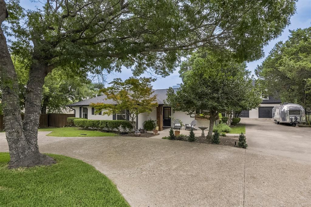 Completely updated and move-in ready, this spacious 3-bedroom, 2.5-bath home offers the perfect blend of style, comfort, and versatility. Luxury vinyl wood flooring flows throughout the home, creating a modern and cohesive feel. The inviting living area features a cozy wood-burning fireplace and beautiful backyard views. The beautifully updated kitchen showcases modern finishes, sleek appliances, ample prep space, and a bright breakfast nook. Step outside to enjoy the beautifully maintained backyard, which features a new wooden pergola, a spacious wood deck, and a sprinkler system for easy lawn care. A charming detached building with electricity provides the perfect space for a craft room, studio, or hobby area. The property also includes a detached workshop garage, offering additional storage, workspace, or parking options. Two separate guest quarters with private entrances provide incredible flexibility for guests, multigenerational living, home offices, or additional living space. With a rear-entry attached 2-car garage and numerous updates throughout, this unique Duncanville property is a rare find. Special Financing Available! Qualified buyers may be eligible for 5.85% financing, FHA, VA & USDA loans, plus 3.5% down payment and closing cost assistance (non-repayable grant). Buyer eligibility and lender approval required.
