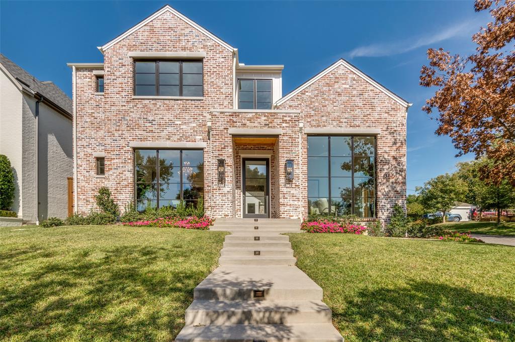 This beautiful C street home was built by DH Development, a husband and wife team that currently live in Preston Hollow. Residing on a desired corner lot, this home was designed to take advantage of the natural topography of Lakewood and stand out in a neighborhood filled with one of a kind properties. Though architecturally driven, the design is quite functional with four bedrooms, a downstairs primary suite, four and a half baths, oversized utility room, butlers pantry, secondary utility space upstairs, white oak floors, and quartzite and quartz countertops throughout.