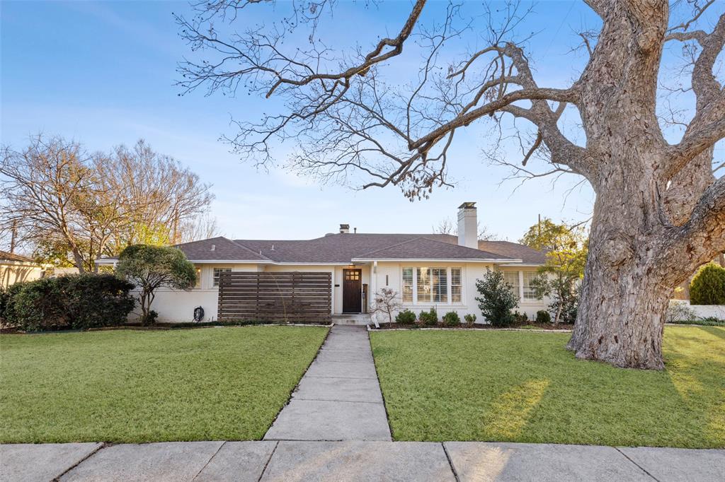 Rare opportunity to own .87 acres in the heart of Lakewood! Beautiful, spacious, well-designed and updated home provides all the neighborhood charm with multiple options to expand out or up. The perfect home to grow in! Open floor plan flows exceptionally well, with an excellent balance of community and privacy. Open concept kitchen-dining-den overlooks an expansive yard, large entertaining deck, modern pool, and pool house; large formal living, office, laundry, plus additional multi-use space and three fireplaces. Primary and 2nd BRs have spacious, dedicated baths and walk-in closets; 3rd full bath serves 3rd BR and guests. Recent improvements include large deck with fire pit, modern pool, and 681 SF pool house-cabana with large bath, walk-in shower, 4th BR, kitchen, open living space with vaulted ceiling, and a wall of windows that slide open to seamlessly merge with al fresco dining area, pool, and picturesque yard bordering McCommas Branch Creek. Walking distance to Lakewood Elementary.