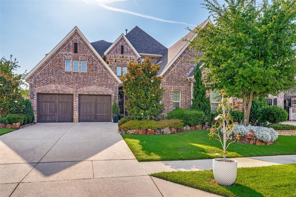 Located within the prestigious gated Willowcreek section of Auburn Hills, this stunning custom residence showcases exceptional design, architectural detail and an elevated living experience. Situated on a prime corner lot just STEPS from the private community pool, the home makes a striking first impression with its inviting courtyard entry. Refined finishes & design elements include extensive handscraped hardwood floors, designer lighting, custom paint details, and rich wood beam ceilings that add warmth and character. The chef’s kitchen is beautifully appointed with a gas cooktop, double ovens, expansive island, abundant storage, and stunning ceiling beam detail, all seamlessly opening to the breakfast area and living spaces. A charming fireplace anchors the space, while the oversized family room is filled with natural light and enhanced by plantation shutters and soaring ceilings. A private study with custom built-ins and French doors offers a sophisticated work-from-home retreat with serene backyard views. The primary suite, tucked at the rear of the home, serves as a true sanctuary, featuring a spa-inspired bath with separate vanities, dual closets with built-ins, and direct access to the well-equipped laundry room. Upstairs, a spacious game room with built-ins and balcony overlook creates a dramatic connection to the main living area below, while the dedicated media room provides the ultimate entertainment experience. Three additional bedrooms and a hidden bonus room perfect for a reading nook or creative space, offer flexibility and charm. Designed for indoor-outdoor living, the backyard is a private retreat featuring an extended covered patio, outdoor kitchen, and ample green space for relaxation, play, or gardening. Complete with a three-car swing garage with epoxy flooring and located within highly sought-after Prosper ISD, this exceptional home offers luxury, comfort, and lifestyle in one of McKinney’s most desirable gated communities.