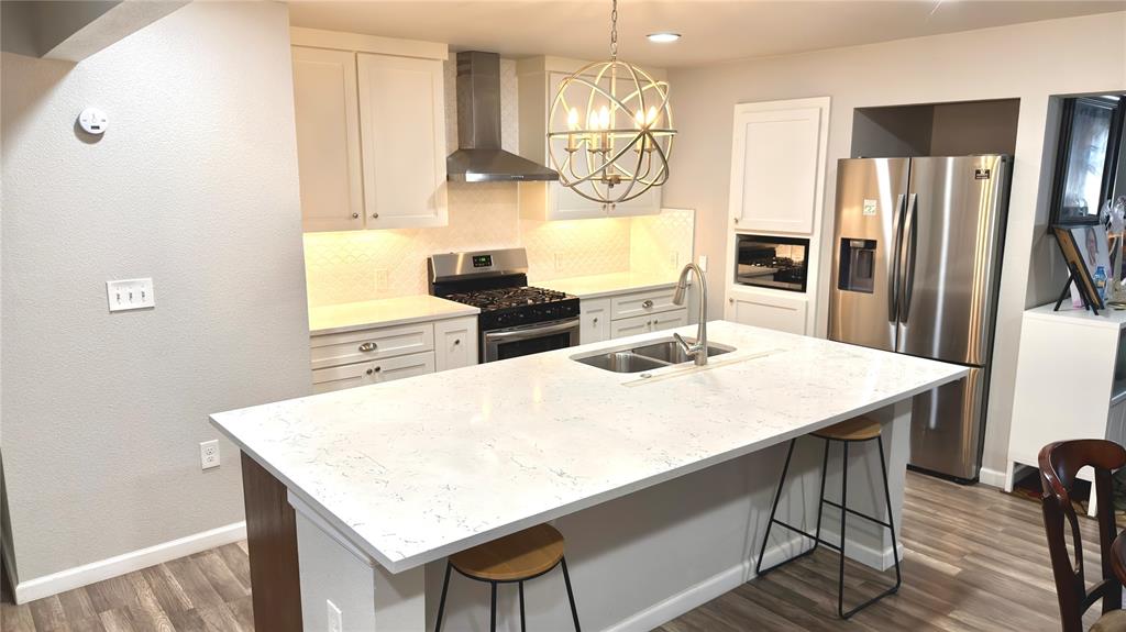 New Price $349,900! Move-in-ready 3-bedroom, 2-bathroom home in the heart of Irving’s charming, established neighborhood. Fully remodeled in 2020, this home features a modern open floor plan with recessed lighting and quality finishes throughout. The spacious kitchen boasts quartz island countertops, custom self-closing cabinets, and stainless steel appliances. Both full bathrooms were updated in 2020 for a luxurious feel. The versatile 6x10 ft bonus room offers abundant closet space, ideal for a home office, gym, or extra storage. Additional highlights include a 2020-installed AC system, a 2023 roof, and solar panels (fully paid off at closing) connected to the grid, reducing energy costs with an average TXU bill of just $72.42 over the past 12 months. The converted garage includes a 10x7 storage area with a roll-up door, and a mudroom off the utility area adds convenience. Outside, enjoy a wood-fenced backyard (installed 2020) with four storage units, all with electricity—one ideal as a workshop, three perfect for equipment or general storage. This home is sold as-is, offering great value with energy-efficient upgrades and flexible spaces for all your needs. Key Features: 3 bedrooms, 2 full bathrooms; 6x10 ft bonus room with massive closet space; Full 2020 remodel with open floor plan; 2023 roof and paid-off solar panels; Average TXU bill: $72.42 (last 12 months); Converted garage with 10x7 storage; Four electrified outdoor storage units; Wood fence and central Irving location. Don’t miss this beautifully updated home with modern amenities and unbeatable energy savings in a welcoming neighborhood!