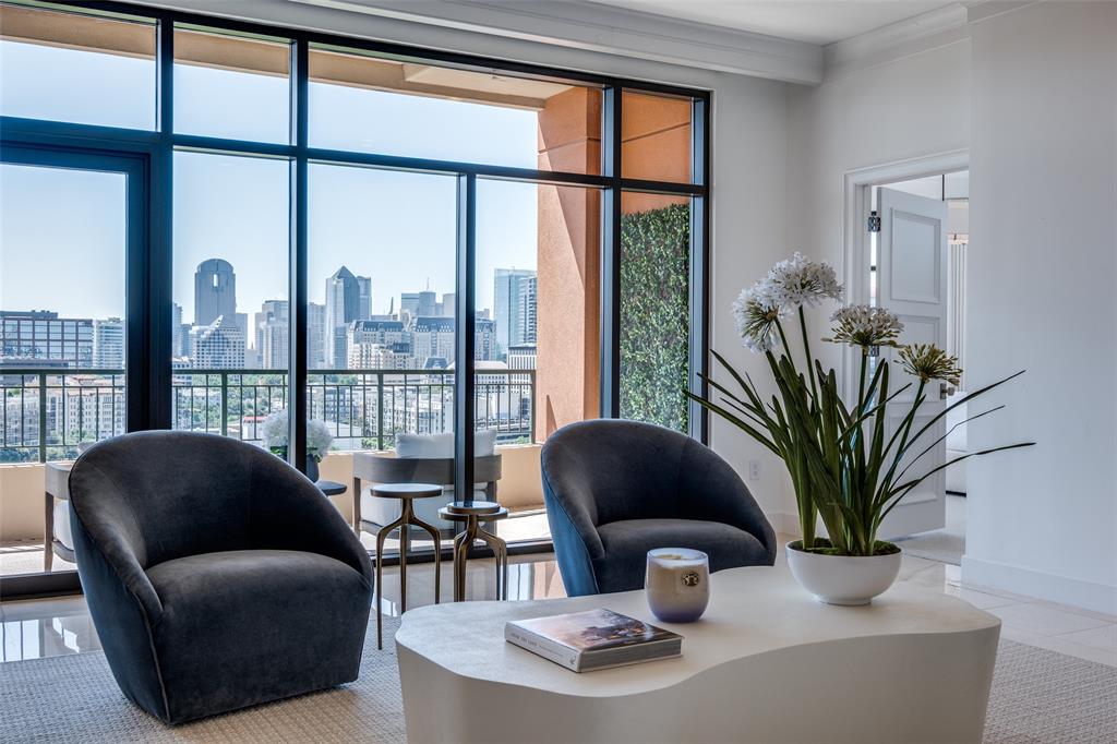 Ideally located beside the legendary Mansion on Turtle Creek and just steps from the vibrant energy of The Katy Trail, this rare, nearly 4,000 sf corner residence is a fully reimagined 3 bedroom, 3.5 bath + study showpiece—an artful union of modern sophistication & timeless elegance. Professionally designed & flawlessly combining two units, this residence has been perfected with only the finest materials & bespoke finishes. Every inch reflects quality & intension.Perched high above the treetops, floor-to-ceiling windows frame sweeping, panoramic views of the Dallas skyline, flooding the expansive open-concept interiors with natural light. Two gracious living areas unfold beneath soaring ceilings, each space crafted with bespoke finishes & designed for elevated entertaining & everyday indulgence.The brand-new chef’s kitchen is a sleek, sensual masterpiece—quartz countertops & a fully outfitted butler’s pantry with exquisite fixtures come together in perfect harmony. Primary bedroom is bathed in soft, natural light by day, & seductively framed by glittering views of downtown skyline by night.The primary bath is pure seduction—Ann Sacks marble and tile, custom reeded cabinetry & dual vanities create a serene, spa-like retreat.Every bedroom is a private haven with its own spa-inspired bath and custom closet. Other notables: richly appointed study, extensive millwork, oversized laundry suite, two fireplaces, & a powder room wrapped in plaster and anchored by a Calacatta marble vanity—a jewel box of style & sophistication.Enjoy three grand terraces where indoor-outdoor living flows effortlessly, wrapped in unmatched privacy & craftsmanship. Plaza II offers an elite lock-and-leave lifestyle with 24-7 concierge, valet, resort-style pool, dual fitness centers & private lounge—all in the heart of Turtle Creek’s most prestigious enclave. Moments from Dallas’ best dining, shopping & cultural destinations, this residence delivers unmatched space, luxury, and privacy. A must see.
