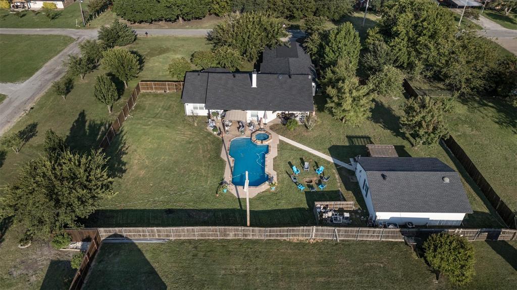 ?? Multi-Generational Estate with Pool, Guest House & Investment Potential in Leonard, TX!
Discover this rare 0.90-acre turnkey property in the heart of Leonard, Texas—just minutes from Hwy 69 & Hwy 78, offering the perfect blend of country charm and city convenience. This multi-home estate features a spacious main residence, a fully equipped mother-in-law suite, and a separate pool house, ideal for multi-generational living, short-term rentals, or income-producing opportunities.

?? Main Home – 2,400 Sq Ft
5 bedrooms  3 full bathrooms

Fully renovated kitchen (2025) with upgraded cabinets, granite countertops, and abundant storage

Open-concept layout with natural light and seamless flow for entertaining

Cozy wood-burning fireplace in the living area

Elegant plantation shutters throughout

New Class 3 roof (2025) with certification for insurance savings

Attached 2-car garage + new 3-car carport (2024)

Exterior lighting and automated sprinkler system for enhanced curb appeal

?? Mother-in-Law Suite – 868 Sq Ft
Private entrance with full kitchen, bedroom, bathroom, and laundry room

Ideal for extended family, Airbnb, or long-term tenants

Separate structure with direct access to pool and hot tub

?? Outdoor Living & Amenities
Heated in-ground pool and spa powered by dedicated propane tank

Pool pump and vacuum replaced in 2025 for worry-free maintenance

Guest house roof replaced in 2022

Pergola-covered patio perfect for outdoor dining and entertaining

Landscaped yard with mature trees and room to garden, expand, or play

?? Prime Location
Located in Leonard, TX, a growing community with small-town charm


Peaceful neighborhood with no HOA and low property taxes

This property checks every box—space, flexibility, and income potential. Whether you're a homeowner seeking a resort-style retreat, an investor looking for rental income, or a family needing room to grow, this estate delivers.