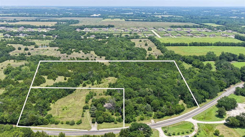 Discover the possibilities with this exceptional offering of two parcels totaling nearly 16 acres in one of Collin County's most desirable growth corridors. Ideally situated on FM 1827, this picturesque property combines natural beauty, outstanding accessibility, and incredible potential. Surrounded by the area's rapid expansion, including new residential development just north of the property, this versatile tract is well suited for a private luxury estate, family compound, equestrian retreat, recreational getaway, future residential development, or a long-term investment in one of North Texas' fastest-growing markets. The land features mature trees, scenic surroundings, and extensive road frontage, providing both privacy and flexibility for a variety of uses. Water and electric utilities are available nearby, making future development even more attractive. Enjoy the best of peaceful country living while remaining just minutes from downtown McKinney, US-75, and the Dallas North Tollway. The property is also conveniently located near Historic McKinney, the PGA headquarters in Frisco, Frisco's thriving corporate corridor, premier shopping and dining, and the rapidly expanding McKinney National Airport. As growth continues to transform this highly sought-after area, opportunities like this are becoming increasingly rare. A home currently sits on one of the parcels; however, the property is being offered for its land value, and the existing residence is considered a tear-down. Whether you're looking to build your dream estate, create a multi-generational retreat, develop for the future, or secure a premier investment, this remarkable property offers endless possibilities in the heart of North Texas.