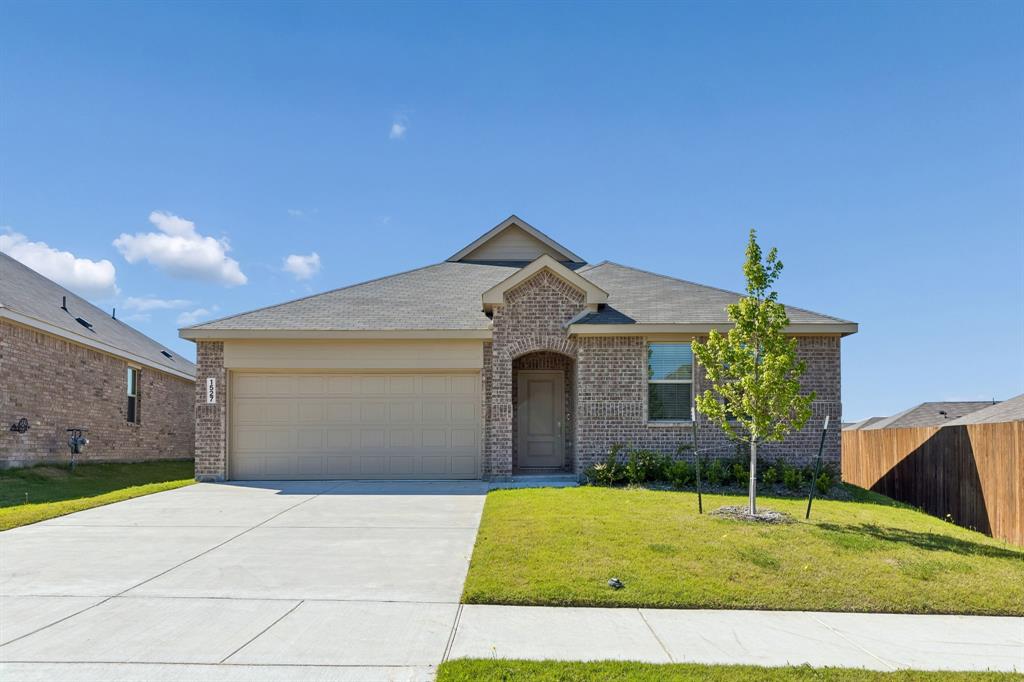 Experience elevated living in this stunning nearly new 2025 residence located in the highly sought-after Eastland community. Thoughtfully designed with both luxury and comfort in mind, this exceptional 4-bedroom, 2-bath home offers nearly 2,000 square feet of sophisticated living space with modern finishes and an effortless open-concept design. Step inside to bright, airy interiors featuring elegant tile flooring, plush carpeted bedrooms, and a seamless layout ideal for both entertaining and everyday living. At the heart of the home is a beautifully appointed chef-inspired kitchen showcasing timeless white finishes, abundant counter space, and a spacious eat-in dining area perfect for hosting gatherings or enjoying quiet mornings at home. The expansive primary suite offers a peaceful private retreat with generous space designed for comfort and relaxation. Outside, enjoy an oversized backyard complete with a covered patio ideal for outdoor dining, weekend gatherings, or relaxing Texas evenings. Residents of Eastland enjoy access to resort-style amenities including a sparkling community pool and beautifully maintained community center. Located within desirable Crandall ISD and just minutes from shopping, charming coffee shops, and iconic local dining, this home perfectly blends modern luxury with everyday convenience. Move-in ready and barely lived in, this exceptional home offers the rare opportunity to enjoy the feel of new construction without the wait.