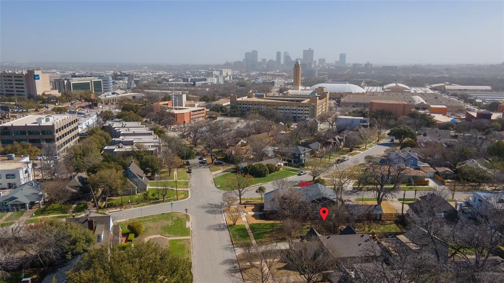 Have you been searching for a great house in the Cultural District to no avail?  Stop searching and build the house of your dreams on much-desired Tulsa Way.  This lot, the last available on charming Tulsa Way, is within walking distance of The Amon Carter Museum of American Art, The Kimbell, The Modern, Will Rogers Memorial Center, Dickies Arena, Bowie House Hotel, and the Crescent complex – everything in Fort Worth’s Cultural District and the West 7th corridor.  Here you get the best of all worlds – a house on a quiet tree-lined street one block from world-class museums, restaurants, and entertainment.
