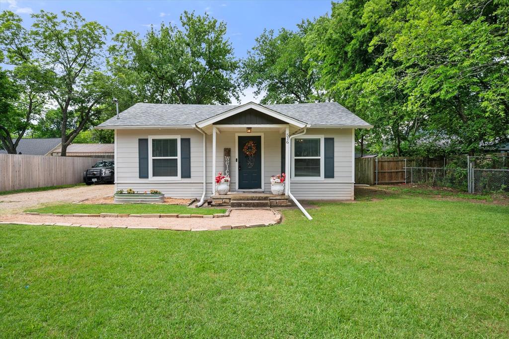 This beautifully renovated Craftsman-style home blends timeless character with modern updates throughout! Featuring 3 bedrooms and 2 bathrooms, this move-in ready property offers updated flooring, vinyl windows, custom cabinetry with granite countertops, and major system upgrades including plumbing, electrical, new roof, HVAC, and ductwork completed in 2017. The true primary suite is a private retreat with a stylish, modern ensuite bathroom. Step outside to enjoy the covered outdoor living space complete with a cozy fireplace — perfect for entertaining year-round. An oversized detached 1-car garage provides incredible storage space for tools, hobbies, or extra parking needs. A rare combination of charm, functionality, and thoughtful updates!