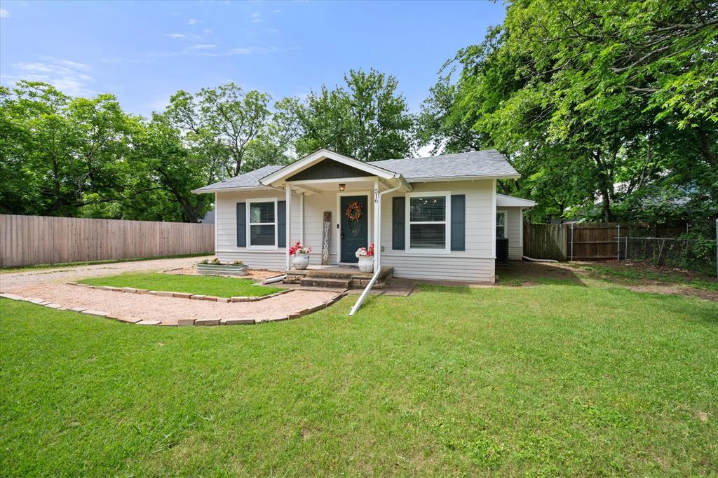 This beautifully renovated Craftsman-style home blends timeless character with modern updates throughout! Featuring 3 bedrooms and 2 bathrooms, this move-in ready property offers updated flooring, vinyl windows, custom cabinetry with granite countertops, and major system upgrades including plumbing, electrical, new roof, HVAC, and ductwork completed in 2017. The true primary suite is a private retreat with a stylish, modern ensuite bathroom. Step outside to enjoy the covered outdoor living space complete with a cozy fireplace — perfect for entertaining year-round. An oversized detached 1-car garage provides incredible storage space for tools, hobbies, or extra parking needs. A rare combination of charm, functionality, and thoughtful updates!