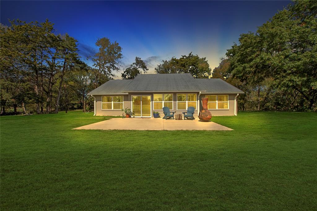 Welcome home to this beautiful, private countryside oasis! Sitting on over 3.5+ acres fully fenced with a motorized gated entrance, this property is your own getaway retreat just outside the city. Step inside the 200sqft sunroom to relax and watch the sunset. This gorgeous remodeled home features a light, bright and open kitchen with a large island for entertaining. Living room just off the kitchen maximizes treed natural views. Primary suite has en-suite bathroom and attached bonus room with two closets. Two other bedrooms and full bathroom. Remodel included spray foam insulation, new aerobic septic, new HVAC and new appliances. Detached two-car garage that can be used as a workshop. The possibilities here are endless with plenty of room to expand or build a second or third home, or any other customizations to your liking. Only 30 minutes north of McKinney and Erwin Park. Don’t miss out on this home!