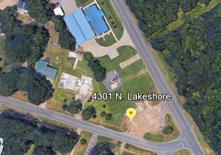 Prime corner tract located at 4301 N. Lakeshore Drive & Tacoma Road, offering exceptional visibility and accessibility. Strategically positioned adjacent to a fire station, this site benefits from steady traffic flow and strong exposure—ideal for businesses that rely on convenience and impulse visits.

This ±0.365-acre parcel features an efficient, easy-to-develop footprint, perfectly suited for a drive-thru concept. Excellent potential for a coffee shop, specialty beverage brand, quick-service restaurant, pharmacy pick-up, or similar high-demand retail use.

The property offers convenient ingress and egress, enhancing customer access and circulation. Its premium corner positioning supports strong traffic counts and maximum brand visibility.

Zoning will require a change from R1-7 to B-3, presenting an opportunity to tailor the site to your specific commercial vision.