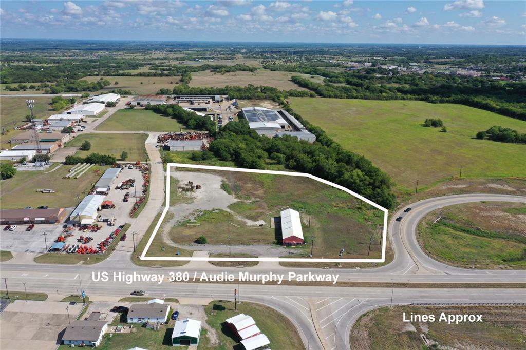 Over 5 Acres HARD CORNER with significant Road Frontage on Audie Murphy Pkwy (aka US Hwy 380), Welch Drive and Hwy 78 Access Road!  High Traffic Count of approx. 21,408 per day on Hwy 380 per the 2021 TxDot Traffic Count.  Most of the value is in the land, but this multiuse building has had prior tenants such as retail sales and gym and has potential to provide new owners with income until they are ready to develop further.  TxDot Maps in Documents.  Buyer to verify zoning of property and possible uses.  This is a rare find as flat ground on Hwy 380 is difficult to find.  The potential for this tract is limitless!