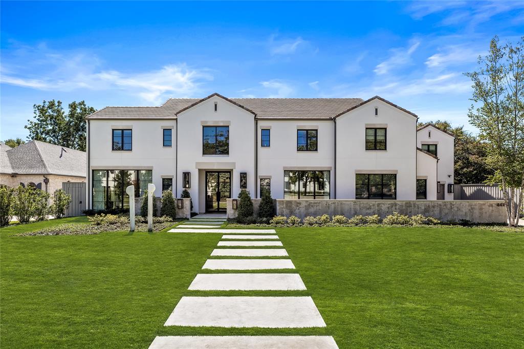 Extraordinary property on .412 acre lot nestled in Preston Hollow, crafted w meticulous attention to detail by Alford Homes in 2020. 1st flr greets you w grand foyer flanked by formal dining feat wine rm & wet bar & sunlit formal living-study w expansive windows & private nook w builtins. Large den w vaulted ceilings, exposed wood beams & gas FP. Open ktchn w high-end applncs, large island w sink, walk-in pantry & coffee bar, adjacent to brkfst rm. Spacious Primary offers cozy sitting area w large windows. Ensuite spa bath w dual vanities, soaking tub, walk-in shower w 4 shower heads & custom closet. Ensuite guest rm on 1st flr, plus media rm, utility, & half bath. 2nd flr feats 3 ensuite bedrms w custom closets. Game rm & fitness rm provide additional areas for relaxation & recreation. The property exudes curb appeal w manicured landscaping, spacious 3-car gar w epoxy flrs, covered patio w phantom screens, gas FP & built-in grill, overlooking pool & spa, turfed yard & putting green.