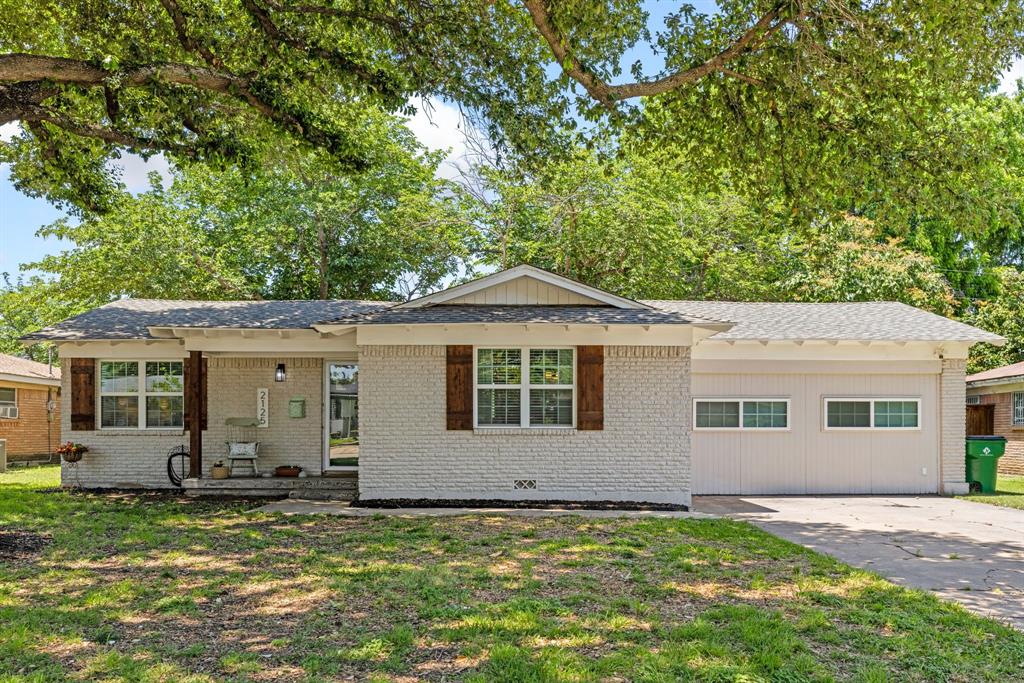 Welcome to this beautifully updated ranch-style home in the heart of Haltom City offering space, flexibility, and affordability with 3 bedrooms, 2 bathrooms, and 1,791 square feet of thoughtfully designed living space. Fresh interior paint, updated finishes, and a desirable split-bedroom layout create a move-in-ready opportunity ideal for first-time buyers or anyone looking for extra room to grow.

The open living and dining areas flow seamlessly into the inviting kitchen featuring rich wood cabinetry, updated hardware, ample storage, subway tile backsplash, and abundant prep space for everyday living and entertaining.

The spacious primary suite offers privacy from the secondary bedrooms thanks to the split floor plan, while updated baths and warm finishes add comfort throughout.

One of the standout features is the incredible flex space with soaring ceilings, loft area, and extensive storage possibilities. Whether used as a bonus room, game room, home office, creative studio, or potential future 4th bedroom, this space offers exceptional versatility rarely found at this price point.

Step outside to enjoy the oversized grassy backyard shaded by mature trees with plenty of room to play, garden, entertain, or simply relax.

Located within a strong school path and with NO HOA, this property offers flexibility, character, and value in one package.