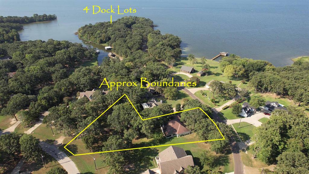 Nestled over 2 lots totaling .82 acres in the coveted Wolf Creek Bay subdivision, this completely remodeled 1,832 SF brick home offers the perfect blend of modern upgrades and peaceful lake living. Located just a short golf cart ride from your own private waterfront pier lots which grant you easy access to the renowned waters of Lake Fork. Golf enthusiasts will appreciate the prime location directly across from The Links at Land’s End, where you can enjoy world-class golfing and dining in the on -site restaurant. Every inch of this charming home has been thoughtfully updated, showcasing premium vinyl flooring throughout the entire house and a completely retextured interior with fresh paint everywhere!! The kitchen is a true focal point, boasting new soft-close cabinetry, a stylish farmhouse sink, and modern fixtures, all complemented by new countertops. An all-gas range adds a chef’s touch, and convenient propane hookups are available for a gas dryer and outdoor kitchen grill! Designed for comfort and ease of living, the open-concept floor plan creates an inviting space for both relaxing and entertaining. The spacious living areas flow seamlessly, with plenty of natural light highlighting the clean lines and contemporary feel of the home. The master suite is perfectly positioned for privacy, located away from the two additional bedrooms, and offers a peaceful retreat after a long day. The screened-in porch is your evening oasis while watching the small deer herd lounging in the yard. This home is not only a beautiful retreat but also a gateway to an active lifestyle. With Lake Fork’s stunning waters & The Links at Land’s End golf course right at your doorstep, there’s something for everyone. Whether you seek quiet relaxation or outdoor adventure, this home delivers it all. Don’t miss out on this rare opportunity to own a piece of paradise in one of the most sought-after communities on Lake Fork. Priced to sell...schedule your showing today!