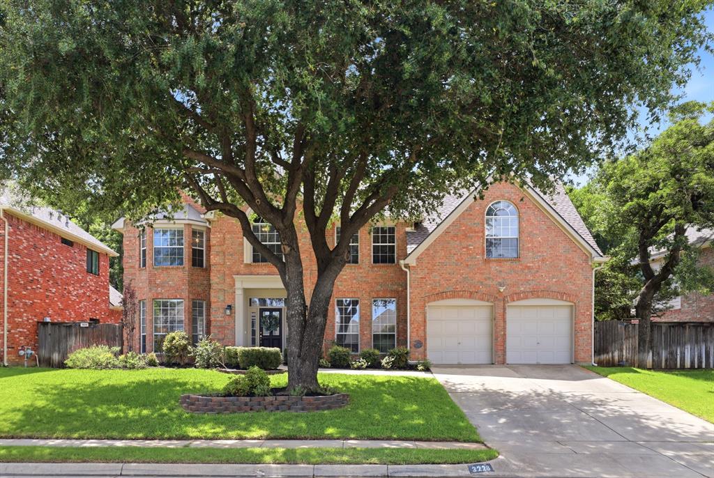 Welcome to one of Grapevine's most beloved neighborhoods, Carriage Glen. Tucked among mature trees and surrounded by the natural beauty of the Bear Creek Trail System, this home offers the rare combination of privacy, recreation, and community that makes residents feel at home.  Discover your own backyard retreat, complete with a sparkling pool, elevated deck, and beautifully tiered backyard overlooking a peaceful tree-lined backdrop.  Whether you're spending summer afternoons poolside or enjoying a quiet morning coffee on the newly re-stained deck (June 2026), this outdoor space was designed to be enjoyed year-round.  Inside, the light-filled kitchen shines with painted white cabinetry, abundant natural light, and recent June 2026 updates including a new cooktop and oven.  Downstairs features an open concept living room, plus a dedicated office and formal living and dining rooms.  All bedrooms are privately situated upstairs, creating a comfortable separation between living and sleeping spaces. The spacious primary suite features double-door entry to an adjoining flex room perfect for a nursery, 2nd home office, fitness space, or private retreat.  Over the garage, a huge game room offers endless possibilities with plenty of room for a media area, ping-pong table, and more.  The Carriage Glen neighborhood is highly sought after for its walkability to acclaimed schools, friendly neighborhood atmosphere, and direct access to the Bear Creek Trail system. Just steps away, Parr Park offers baseball and soccer fields, playgrounds, a splash pad, basketball court, and miles of scenic walking and biking trails. It's a neighborhood where families gather, kids ride bikes, neighbors connect, and outdoor living becomes part of everyday life.  This is an opportunity to experience one of Grapevine's most treasured communities.