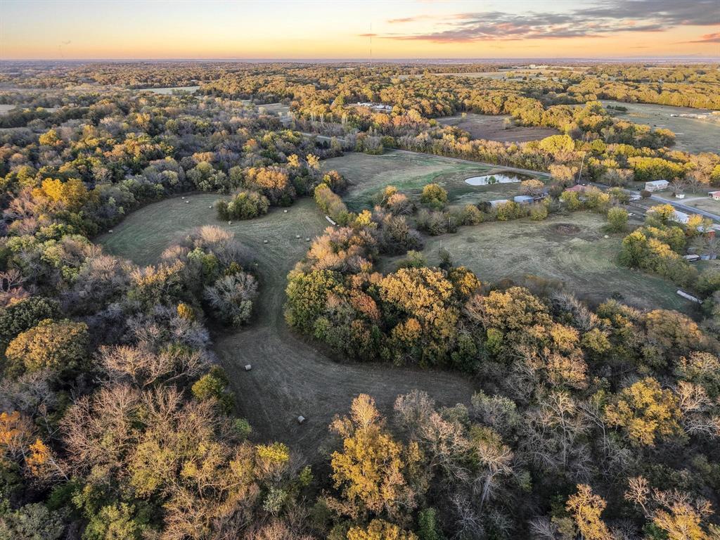 Welcome to your perfect country retreat! This 17.53-acre property features a remodeled home and a spacious metal shop, all within the desirable Bells School District and just minutes from Denison and Sherman. The home offers an excellent layout with large rooms throughout. The kitchen is open to the living area and includes a pantry, a generous island, and elegant marble countertops—perfect for entertaining or family gatherings. Just off the kitchen is a nice-sized laundry room for added convenience. The master suite features a large bath and walk-in closet. Enjoy relaxing evenings on the covered front porch while taking in the peaceful views of your fully fenced property. The home has a durable metal roof, and the HVAC system and windows were replaced approximately six years ago, providing peace of mind. Outdoors, you’ll find a large 24X30 metal shop with a roll-up door, tree-lined acreage with cleared areas, and abundant wildlife including deer, hogs, and turkey. Whether you’re looking for a quiet homestead, a place to hunt, or room to grow, this property has it all.

Don’t miss the chance to make this one yours!