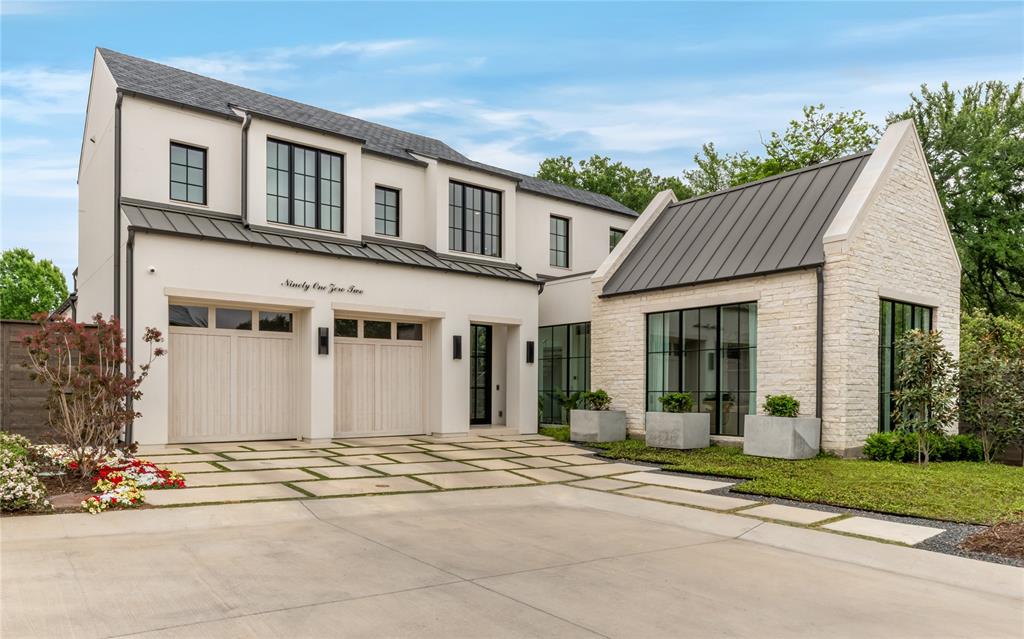 This private architectural retreat is designed for those who value quiet luxury, intentional design, & uncompromising quality. Tucked at the end of a secluded cul-de-sac in the gated community, Bluffs at Cochran Chapel—home to just 12 residences—this custom-built modern home by Mark Molthan Platinum Homes offers exceptional privacy & refined sophistication. Set on the community’s quietest lot, backing to estate properties along Cochran Chapel Rd, the setting is both serene & prestigious. Spanning +5,300 SF, the home balances natural light with architectural drama. Floor-to-ceiling windows & a sculptural floating staircase define the interiors, while design by RN Interior Design blends warm textures with clean modern lines. The chef’s kitchen features a marble waterfall island & Italian-made Officine Gullo range. A separate wet bar & catering kitchen with Wolf double ovens, sink, dishwasher, & walk-in pantry allow seamless entertaining. Open living & dining areas extend through sliding glass doors to a sunroom with Isokern FP & retractable walls, connecting to a private yard with turf, grill, & water feature. The main-level primary suite offers a white oak paneled wall, designer lighting, & serene views. The bath includes dual vanities, two Toto water closets, soaking tub, walk-in shower, & a two-level custom closet. A study with FB & closet can serve as a guest suite. First floor also includes powder bath, utility, mud area, & additional outdoor living. Upstairs offers two bedrooms, including a secondary primary suite. Notable features include Sub-Zero beverage fridge, Scotsman ice maker, 3-car garage, epoxy floors, hardwired shades, Control4 system, 4 Trane HVACs, foam insulation, whole-home water filtration, 2 Rinnai tankless heaters & full house generator.  Further enhancements include a stucco & brick exterior, metal & composition roof, & curated landscaping. The home's furnishings are also  available to be purchased allowing a truly turnkey opportunity.