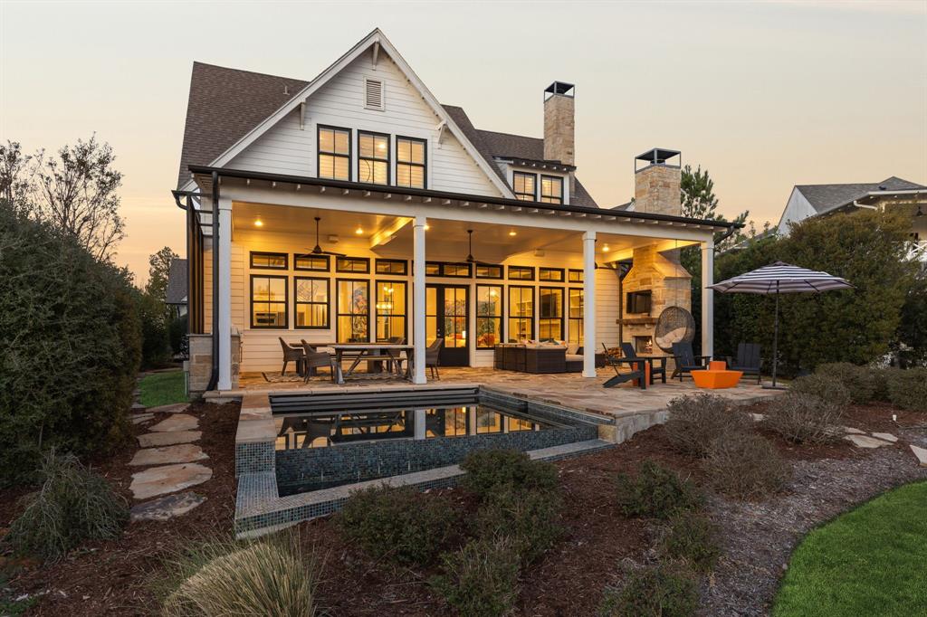 Where Lake Days End with Game Nights
An art-filled Long Cove lake house designed for entertaining, exceptional outdoor living, and weekends you never want to end.

Tucked along the shoreline in the private community of Long Cove on Cedar Creek Lake, 12735 Sea Island offers a lakefront retreat where design, creativity, and relaxed lake living come together. Originally built in 2018 and thoughtfully enhanced since, the home blends refined style with a playful spirit.

Expansive windows frame beautiful water views while exposed beams and warm finishes create an inviting open living space. The chef’s kitchen features a generous island and commercial-grade appliances, flowing easily into the dining and living areas anchored by a fireplace and walls of glass overlooking the lake.

The home offers four bedrooms, including a spacious primary suite designed as a peaceful lakeside retreat. A bunk room and guest spaces allow plenty of room for family and friends to stay the weekend. A 750 sq ft apartment is nicely positioned over the three car garage.

One of the home’s most memorable spaces is the expansive game room. Perfect for game nights, teenage hangouts and late night conversations. This vibrant, art-filled gathering space offers a wet bar and loungy sofa areas.

A newly constructed three-car garage provides storage for lake toys and golf carts, while the private apartment above offers views of the lake and chic, comfortable accommodations for up to 5 houseguests.

Perched to capture sweeping lake views, the private plunge Spool offers an intimate, resort-style escape designed for both relaxation and entertaining! It can be heated to 105 degrees making your lake house the perfect place for winter too!

Located within the gated community of Long Cove, owners enjoy miles of trails, resort-style pools, sports courts, parks, boat docks, and the iconic Toy Barn — all just over an hour from Dallas.