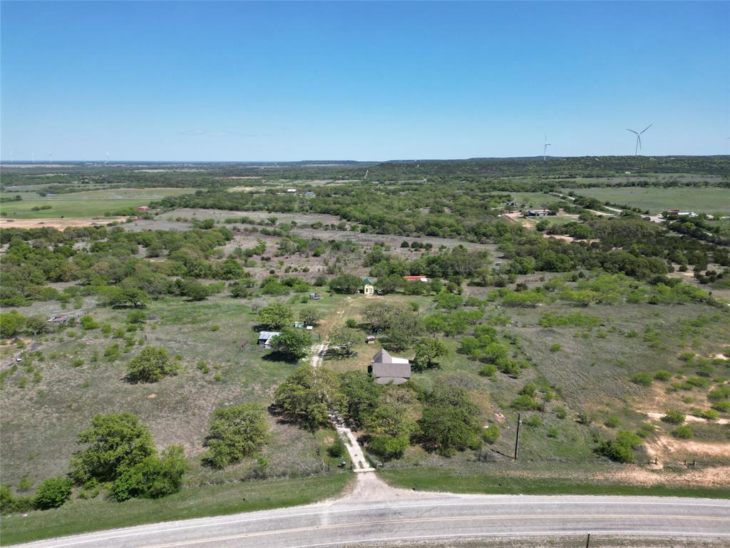 Discover the freedom and privacy of approximately 17± acres featuring a blend of mature oak trees, open pasture, and multiple functional improvements already in place. This versatile property offers a solid foundation for a homestead, weekend retreat, or future development.
A charming two-story cabin serves as the primary living structure, offering 1 bedroom and 1 bathroom with rustic character and room to customize. An additional older home sits on the property as well—currently not livable and in need of extensive repairs, but full of potential for restoration or repurposing.
The land is equipped with a water well, electric service, and multiple water faucets conveniently located throughout the acreage. The property is perimeter fenced and cross-fenced, making it suitable for livestock or agricultural use. A storage container provides secure on-site storage, and a greenhouse offers gardening opportunities with some repair work.