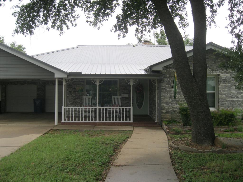 YOU MUST SEE THIS CHARMING HOME! Full of character and decorated by a professional! 3 living areas. Original living room currently used as formal dining, but could be parlor, music room. Home completely remodeled 5 years ago with all new appliances, kitchen totally changed--new cabinets and configuration, dw, built in microwave, 2 large ovens, pantry. Granite counters and one making breakfast bar and dining area which flows to large family room. Focal point is brick walled fireplace with hearth seating and HUGE walk-in closet. Adjacent to family room is cheery sun room that is also heated and cooled making entertaining a breeze with access to the covered patio in privacy fence back yard. Guest bedroom is close to bathroom with tub shower. Primary bedroom is large with double closet and has huge ensuite bath. 3rd bath is adjacent to utility room with outside door. This area also connects to 2 car attached garage with openers and there is another door from house to garage.Plenty of parking space as there is also an attached 2 car carport! An attic access to huge floored storage is in garage. 3 storage buildings in yard. 2 Water heaters, 2 HVAC systems.This house has much to offer for first timers, empty nesters, someone who wants to scale down but has lots of things! Everyone who has ever been in this charmer loves it. Make arrangements to see this beauty today!