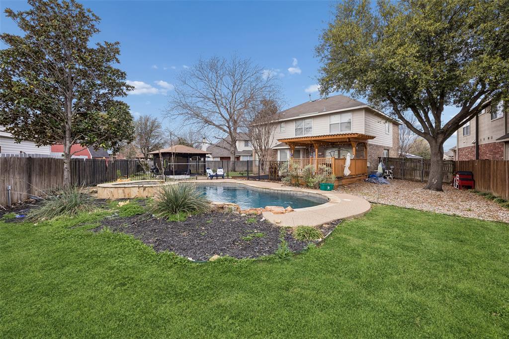 HIGHEST AND BEST BY SATURDAY JUNE 27th at 8PM. OPEN HOUSE SATURDAY 3-5 PM - Priced to sell AS-IS. This property presents a fantastic opportunity to make it your own while enjoying generous space, a cul-de-sac location, and a lovely pool in the backyard. Recent roof and HVAC updates add peace of mind, and the home is in great overall condition. Tucked away on a large lot in a desirable No HOA community, this spacious home offers a wonderful layout, abundant natural light, and a backyard retreat complete with a pool and deck. The inviting living room sits at the heart of the home, highlighted by a stately fireplace and filled with natural light that flows seamlessly into the kitchen. The eat-in kitchen is designed for both everyday living and entertaining, featuring built-in appliances, a breakfast bar with seating, a center island, and a bright breakfast nook. A formal dining room provides the perfect setting for hosting gatherings and special occasions. A junior suite conveniently located on the first floor near the kitchen offers flexibility for guests or multigenerational living. Upstairs, you’ll find the spacious primary bedroom with a comfortable sitting area and an ensuite bath featuring dual sinks, a separate shower, a relaxing soaking tub, and a walk-in closet. The family room, additional bedrooms, bathrooms, and laundry room are also located on the second floor, providing a functional and private living arrangement. Enjoy the backyard oasis, where a deck and fenced pool create the ideal space for relaxing, entertaining, or enjoying warm Texas days.