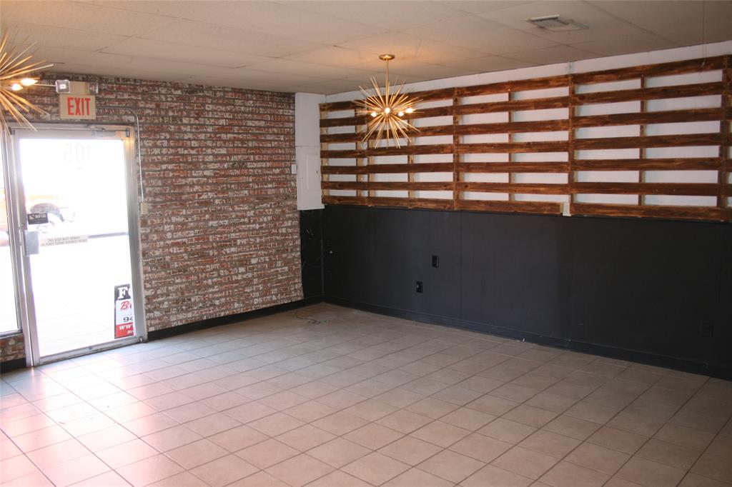 There are two attached buildings with building entrance at 105 and 107. Building 105 is move in ready depending on the type of business. It has tile floors, and a drop down ceiling. There is a bathroom, entry room, and three other adjoining rooms. The second office is 107, and it needs some work. This is a great location since it is just off of Hwy 281 and First Street. The Baker hotel is just two blocks away. The two buildings could be joined together, since they are on the Appraisal District as one.