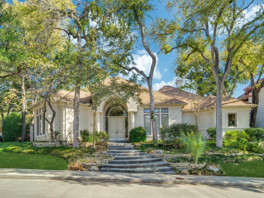 Elegant corner house in prestigious gated and guarded community of Lake Forest. This home sits on an elevated lot with a cascading Koi pond that greets you as you walk to the front door. Features abundant natural light and lots of space; including a gourmet kitchen (with an oversized Sub zero refrigerator) large home office, downstairs master suite overlooking the patio and swimming pool, exercise or dressing room off the master, media room and two additional living areas. Work from home and have private and secure walks on the park like setting of this perfect location.