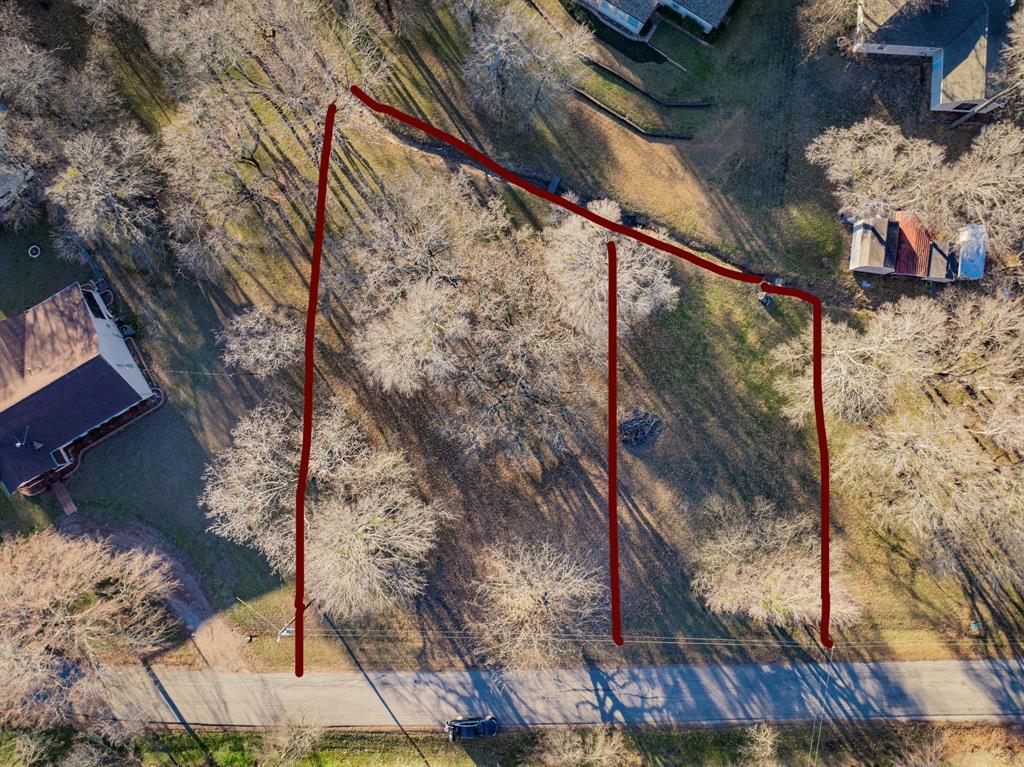 Build your dream home on this.21-acre lot in the quiet lakeside community of East Tawakoni, TX. The neighboring .25-acre lot is also available, offering the rare opportunity to purchase a combined.46 acres for additional space and flexibility. City utilities are available at the road (no utilities currently installed on the property). Deed restrictions require a minimum 1,250 sqft site-built home, with at least 25% of the exterior constructed of rock or brick. No mobile homes, manufactured homes, trailers, or TVs are permitted. Enjoy small-town charm with convenient access to Lake Tawakoni, shopping, and dining. An excellent opportunity for a custom home or investment. Greenville, TX being 25 miles, Rockwall, TX being 40 miles away, and Royse City, TX being 35 miles away!