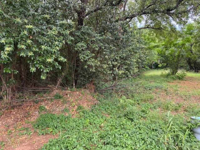 Double lot. Great location. Surrounded by site-built homes in gated and guarded Indian Harbor. Indian Harbor amentities include a private marina with boat slip rentals and a boat ramp, clubhouse with a swimming pool, tennis courts, playground and a volunteer fire department.