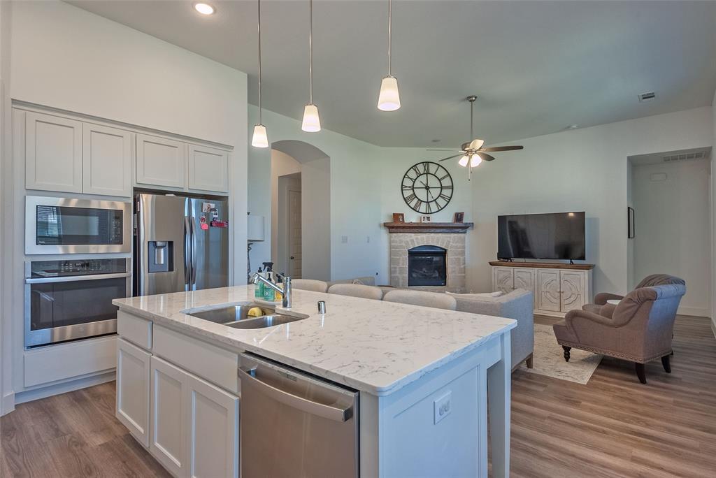REDUCED for quick sale, Beautiful like-new one home with open floor plan in the heart of Anna, minutes from highways, shopping, and dining. Quiet neighborhood with fitness club, pool, and clubhouse included with HOA.