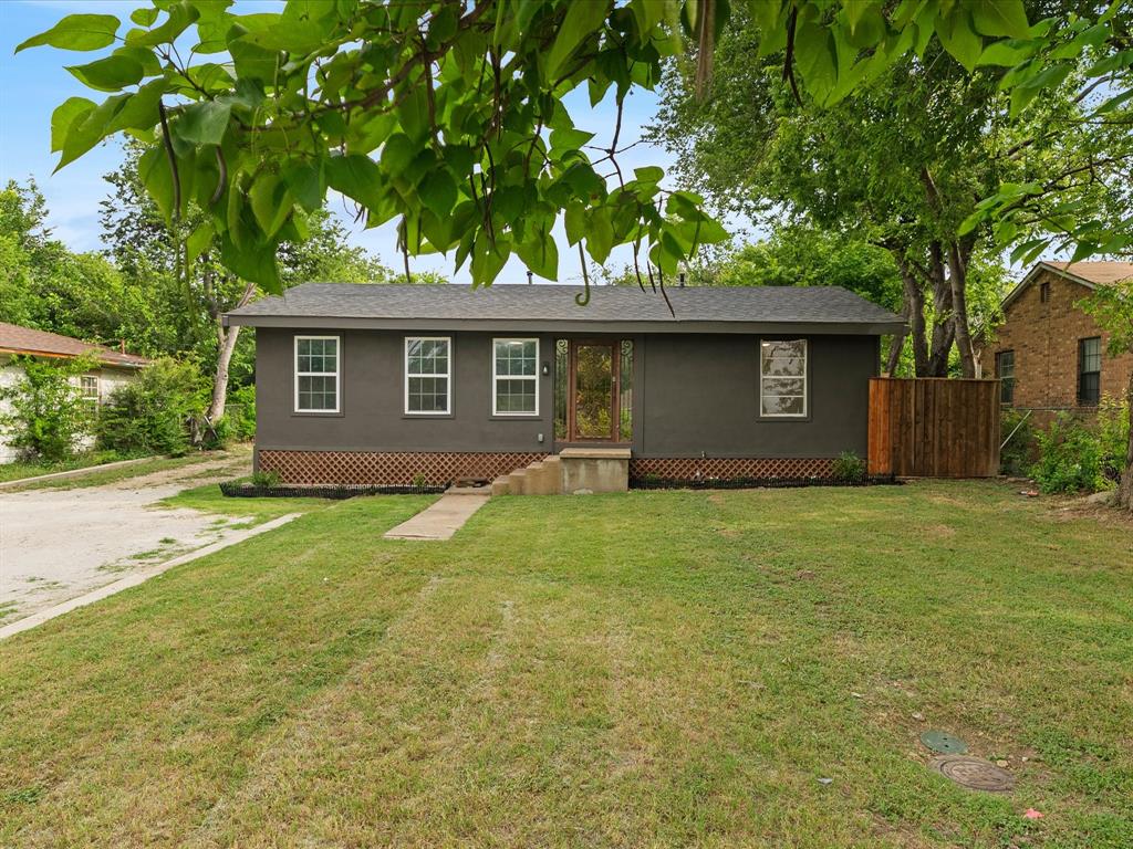 Welcome to this beautifully remodeled 3 bedroom, 2 bathroom home offering modern updates and functional living. Recent improvements include fresh interior and exterior paint, new flooring throughout, updated tile bathrooms, quartz countertops, new appliances, and a tankless water heater. The detached garage provides additional storage, workspace, or parking options. Conveniently located with easy access to shopping, dining, and major highways, this move-in-ready home is ready for its next owner.