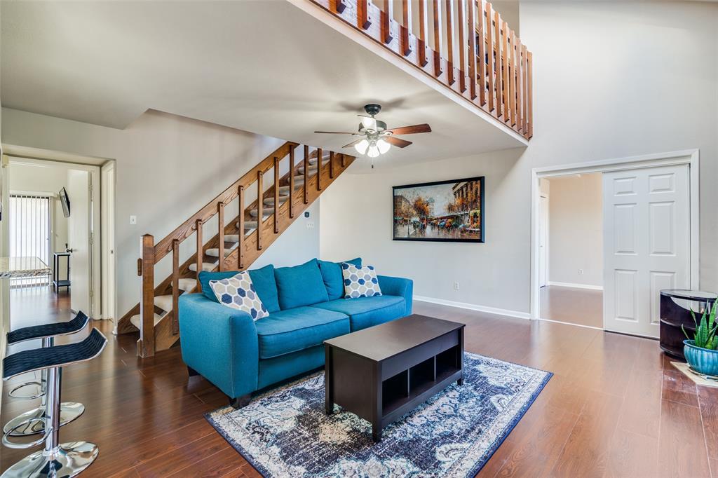 Welcome to this adorable condo just a short walk from the Harbor District and minutes from I-30! This beautifully updated home is move-in ready, featuring a master suite on the main level, a kitchen with granite countertops, and a mosaic tile backsplash. The main level also includes a second second bedroom, also perfect for an office space, and a large open living area with a fireplace, vaulted ceilings, skylights and balcony access. The second level offers an additional master suite, along with a loft area equipped with built-in bookshelves. Enjoy panoramic views from the oversized balcony, which also has a private storage closet. This unit comes with two assigned parking spaces right out front. The community enjoys three  beautiful pools, one conveniently located within walking distance of this unit. Don't miss the chance to call this stunning condo your new home! Roof has been replaced for the entire community!