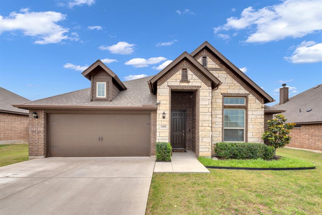 Welcome home to this 3 bedroom, 2 bath home with a 2 car garage and dedicated office blends comfort, function, and style. Set on a quiet street, it offers both privacy and a welcoming neighborhood feel.

Step inside to an open-concept floor plan that connects the kitchen, dining, and living areas into one bright, cohesive space ideal for both everyday living and entertaining. Large windows bring in natural light, and the main gathering area often centers around a stylish media wall.

The kitchen serves as the heart of the home, typically featuring a generous island with seating, ample cabinetry, and modern finishes that make cooking and conversation effortless.

The primary suite includes a spacious bedroom, a private bath with dual sinks and walk-in shower or soaking tub, and a walk-in closet. Two additional bedrooms share a well appointed second bath, offering flexibility for guests, family, or hobbies.

The dedicated office set slightly apart from the main living area provides a peaceful space for remote work, study, or creative projects, adding true modern day practicality.

Outside, you’ll likely find a covered patio perfect for relaxing or entertaining, while the attached two-car garage provides convenient storage and parking.

Altogether, this home combines open living, thoughtful layout, and quiet surroundings designed for both productivity and relaxation.