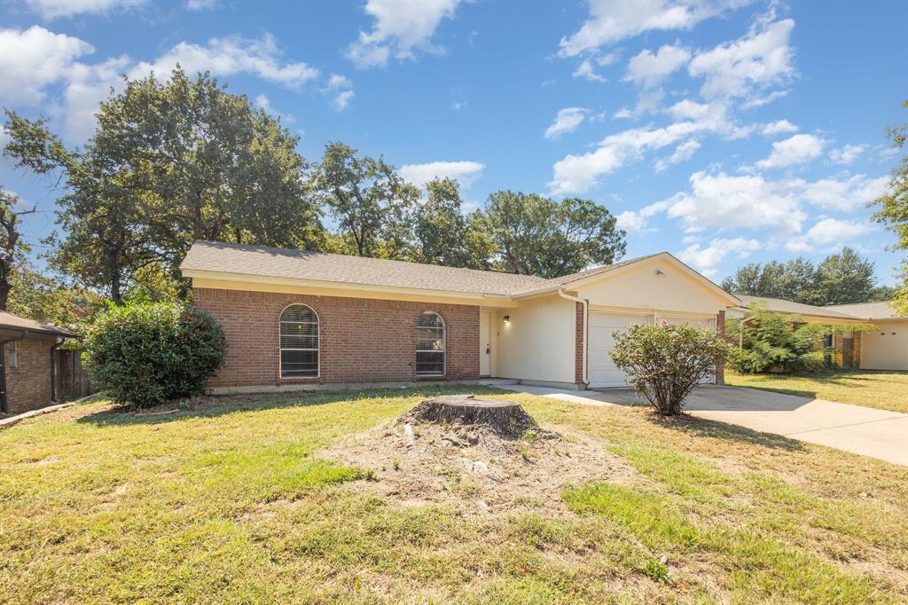 Welcome to 5616 Atlantis Terrace — a 3-bedroom, 2-bathroom brick home offering approximately 1,303 square feet of comfortable living space in a desirable pocket of Arlington, TX. Priced to move, this home delivers incredible value for buyers seeking convenience, comfort, and community at an unbeatable price point.

Inside, discover an inviting open-floorplan layout where the living room, kitchen, and breakfast area flow seamlessly together. The kitchen features a stylish slide-in smooth-top stainless steel range nestled within a functional island, topped by a modern stainless steel and glass range hood that adds a sleek contemporary touch. A cozy cornered brick veneer fireplace anchors the living space, creating a warm focal point. 

All three bedrooms feature carpeting in good condition, while the remaining living areas are finished with wood-look vinyl flooring for easy maintenance. The laundry area is conveniently tucked into the kitchen for effortless everyday routines.

Outside, you'll find a large fenced backyard — complete with mature shade trees, a deck, and a patio area perfect for weekend gatherings.

Location truly sets this property apart. Thora Hart Park sits just minutes away, while Sprouts Farmers Market and local shopping plazas offer everyday convenience. You're only five minutes from Lake Arlington's boating, fishing, and scenic trails, and just ten minutes from the Arlington Entertainment District — home to the Texas Rangers, Dallas Cowboys, and the National Medal of Honor Museum. Ready for occupancy and perfectly positioned! Conveniently located about 3 miles from I-20 and HWY 287. Don't hesitate and schedule your appointment!