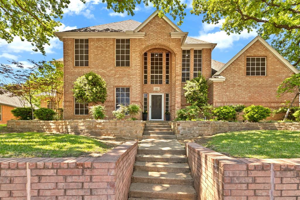 Welcome to this stunning Highland Oaks home with a POOL in the highly sought-after Keller ISD! Spacious and thoughtfully designed, the floor plan features a gorgeous master suite with soaring ceilings, a luxurious master bath, and direct access to the backyard oasis. Downstairs you’ll find an additional private bedroom and full bath — ideal for a mother-in-law suite or guest retreat. Upstairs offers a large flexible room with a full-size closet and split bath that works perfectly as a media room, game room, or fifth bedroom, plus two additional bedrooms. The bright, pretty kitchen boasts granite countertops, a breakfast bar, and flows to two dining areas and two living areas — ideal for entertaining. Outside, mature trees and landscaping create a serene setting around a covered patio. All AC units were replaced within the last three years for added comfort and peace of mind.
