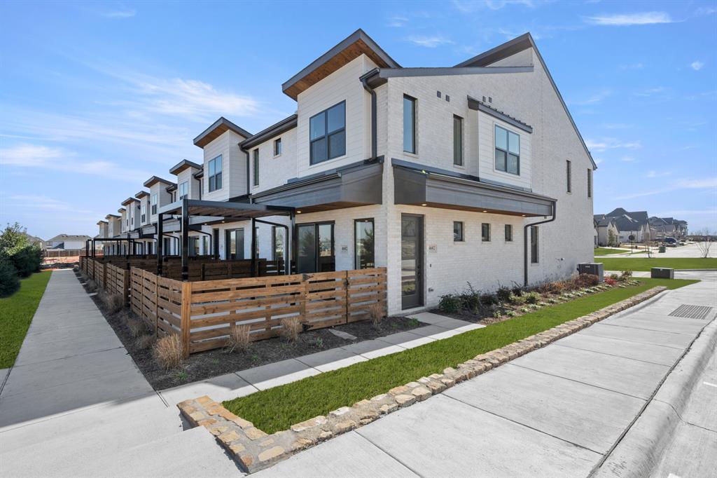 MLS# 21067250 - Built by Grenadier Investments - Ready Now! ~ **Sun's Out in June, Savings On - Discover Better Savings with Improved Pricing + 3.99%* Interest Rate Buydown and $7,000 in Closing Costs OR up to $15K in Incentives on all Move-In Ready Homes (See Sales Counselor for details)** The Elm Plan located in the desirable Wildridge community offers 1,840 square feet of thoughtfully designed living space. This end-unit townhome features abundant natural light, 3 spacious bedrooms, and 2.5 bathrooms. The open floor plan includes a large dining area and an open living space filled with natural light, ideal for everyday living and entertaining. A generous pantry adds convenience, while the primary bedroom provides a comfortable and private retreat. Additional features include a private fenced patio, a 2-car garage, and a blend of modern and traditional design elements throughout. Enjoy low-maintenance townhome living in a vibrant community. These homes qualify for USDA 100% financing with no down payment for eligible buyers and offer competitive interest rates. Qualification requires a minimum of 580 credit score and meeting USDA income and debt ratio guidelines. USDA financing also allows qualified buyers to roll closing costs into the loan, reducing out-of-pocket expenses at closing. This program is well suited for first-time buyers or those who may not qualify for conventional financing. USDA-eligible properties are rare in the DFW area. Investors are welcome.