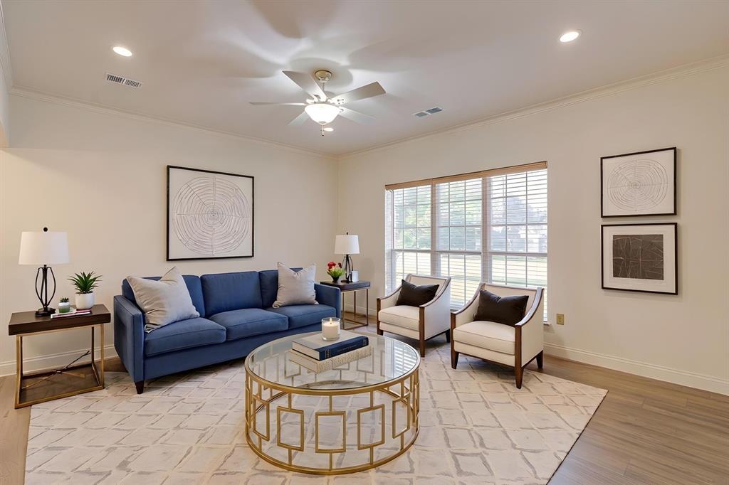 Coveted first floor unit in Royal Orleans South. The sparkling community pool is just steps away from your covered back porch to enjoy your morning coffee. This move-in ready is condo features 2 large bedrooms and 2 updated bathrooms. The primary suite has enough room for a sitting area it also includes an ensuite bathroom with a large walk in closet!!! There are new hardwood floors and carpet through out the condo along with paint. 
The large living and dining area are open to each other and perfect for entertaining. The kitchen features granite counter tops, lots of cabinets, refrigerator, pantry. Ample counter space for cooking! The second living area could also could be a third bedroom if you needed. There are new french doors that open to the covered back porch that over looks the community pool and is just steps away from your covered assigned parking space. 
The well maintained community is located close to TCU, right off Overton Park with trails, tennis courts, and play ground for children.  It is in the heart of Fort Worth with easy access to downtown, hospitals and Lockheed Martin. This condo is zoned to the exceptional Overton Park Elementary. Walk able to grocery stores and restaurant's ts the perfect spot. HOA dues cover electricity, water, concierge trash service, recycling, exterior maintenance, and use of the community pool.