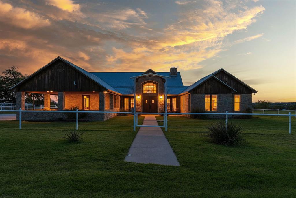 Set on 47+ picturesque acres, this well-appointed ranch property offers the perfect blend of comfort, functionality, and country charm. The 3 bedroom, 3.5 bath rock home features beautiful custom rock and woodwork throughout, highlighting a timeless rustic ranch style with quality craftsmanship. The property also features a 960 sq ft mother-in-law suite, built in 2021, providing a private 1-bedroom, 1-bath space ideal for guests or extended family. The property is well equipped for livestock and horses featuring a 25x32 barn with 2 large stalls and a climate controlled tack room, including a large 36x36 slabbed shop with roll-up doors and 15 ft shed extensions on both sides. Located behind the barn are pipe working pens, and a round pen. Additional improvements include pipe fencing along the driveway and surrounding the yard, a water well, and a beautiful in-ground swimming pool with a gorgeous patio to enjoy the peaceful ranch setting.  This versatile property offers the space and infrastructure to support a working ranch or a private country retreat.