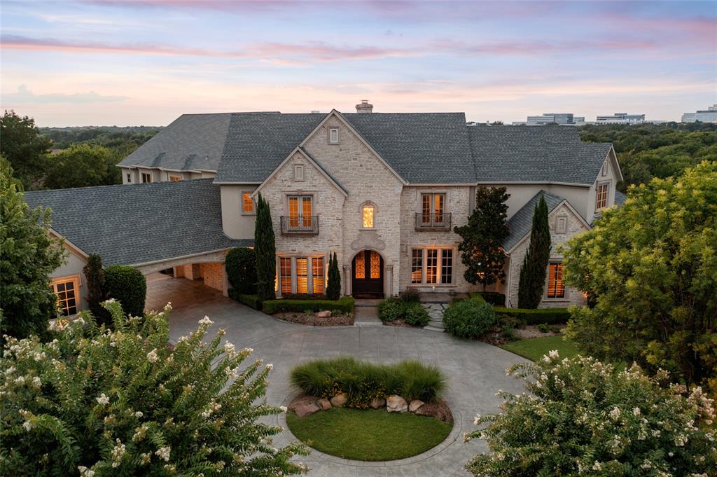 Looking for privacy, wide open space and the best location in North Texas?  Come experience resort living in the Heart of Frisco!  This majestic 9,988 sqft home is situated on almost 2 heavily wooded acres in the exclusive gated Stonebriar Creek Estates. This elegant estate boasts 6,500 square feet of downstairs living space including a rare 2BR-2BA full apartment & 1st floor theatre room. Master suite w large his-hers walk-in closets and fabulous views.  Upstairs are 4 addl bedrooms, game room, 395 ft home gym, upstairs laundry plus 650 ft of AC storage future space (not incl in home size). 5 oversized garages.  Back yard is perfect for entertaining with spectacular city views in a serene park-like setting.