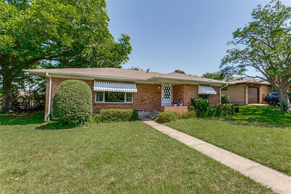 BROKER IS TRUSTEE and BENEFICIARY OWNER. This brick beauty is on a large lot in the sought-after Richardson ISD. 2 bedrooms, 1 bath with a 1 car detached garage. Original brick home boasts a covered front porch with a lovely brick planter box. Inside you'll see beautiful original hardwoods throughout house. Primary bedroom is huge and comfortably accommodates a king size bed and night stands. The large living room is perfect for game-watching or game night. Dining area flows from the kitchen and is nicely suited for those holiday get-togethers. Bathroom has original tile. HVAC system was installed in 2022. The property is conveniently located with just a 7 min walk to the Arapaho Center DART station.  And this beauty is only a 3-minute drive to a variety of Greenville Ave., Arapaho and Main Street restaurants. Local stores and coffee shops are also nearby.